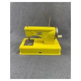 Casige Yellow Tin Toy Sewing Machine