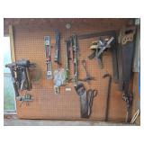 Wall Contents: Hammers, Saws & Pry Bars