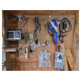 Wall Contents: Chain Hooks, Locks, Livestock Prod