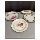 Assorted Porcelain Serving Dishes and Floral Decor