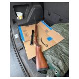 other side 1022 Ruger w/Bushnell scope