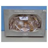 PORC. LADY W/FABRIC FAN