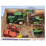 SEVERAL SMALL TOY TRACTORS