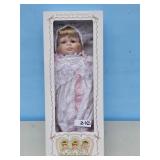 PORC. 3 FACED DOLL