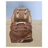2 BOWLING BALLS IN BAGS