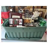 Tote of picture frames and wall hanging