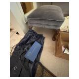 Living room foot stool alternating with foot pad