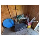 Garden hoses, kiddie pole and plastic storage
