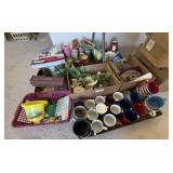 Coffee cups, candles, teapots & religious books