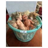Basket of dolls w batting eyes