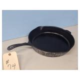 C-I SKILLET APPROX. 13 INCHES IN DIA. NAME IS HARD
