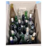 BOX OF CLEAR AND GREEN BOTTLES USED FOR