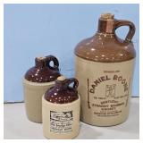 2-SMALL CROCK JUGS & DANIEL BOONE HALF GAL.