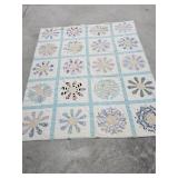 HANDMADE QUILT APPROX  74X71-DOES HAVE TEAR