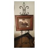 Family portrait with gilded frame on easel