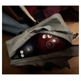 2 bags of golf clubs & 2 bowling balls