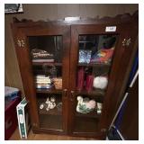 Glass fronted book case 36Wx50Tx11D