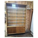 DOUBLE SLIDING GLASS DOOR CABINET W/GLASS SHELVES