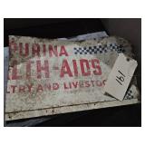 VERY PARTIAL OF PURINA SIGN FROM THE FEED STORE