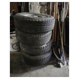 SET OF CHEVY 15 INCH RIM AND TIRES