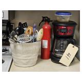 COFFEE POT, CROCK WITH UTENSILS AND A FIRE