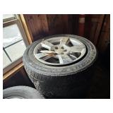 SET OF ALUM CHEVY TIRES & RIMS 1 NOT HOLDING AIR