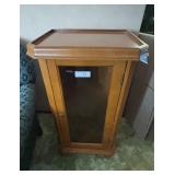 Glass fronted bookcase