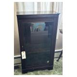 Glass fronted book shelf