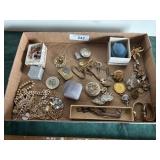 Ike dollar money clip and misc. costume jewelry,