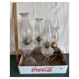 3 kerosene lanterns n 1 electric lamp