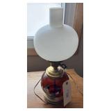 Ruby red glass base with milk shade lamp