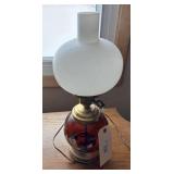 Ruby red glass base with milk shade lamp
