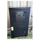 Glass fronted book shelf