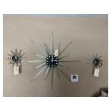 Gold starburst wall clock with matching