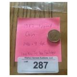 1983 coin 1 pound 146.9 gr looks to be silver