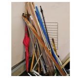 Assorted Items - Umbrellas, Poles, and More