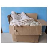 Cardboard Box with Towels and Blanket