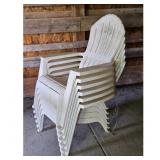 Stack of 6 White Plastic Adirondack Style Chairs
