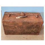 Vintage Steamer Trunk Luggage with Newspapers