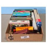 Assorted HO Scale Model Train Cars and Accessories