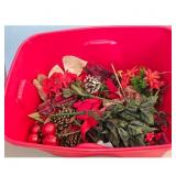 Red Plastic Storage Bin with Christmas Decorations
