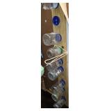 PLASTIC JARS HANGING IN GARAGE WITH MISC. HARDWARE