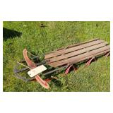 Wooden Sled with Red Metal Frame