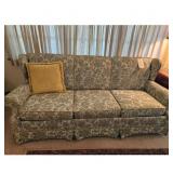 Vintage Floral Sofa with Yellow Accent Pillow