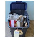 Blue tote ful of pierced tin: Storage Bin Contents