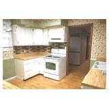 Kitchen view w/ range 