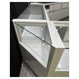 Three display cases plus a corner display One is