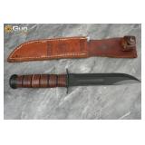 One Ka-Bar USMC fixed blade fighting knife. Very G