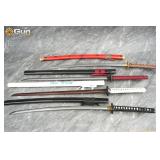 Swords. Very Good. Four Swords with scabbards. (83