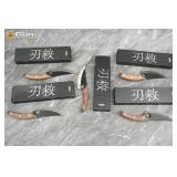 Five Huusk premium control knives with boxes. Like